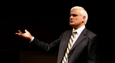 Ravi Zacharias sharing the gospel to an audience.